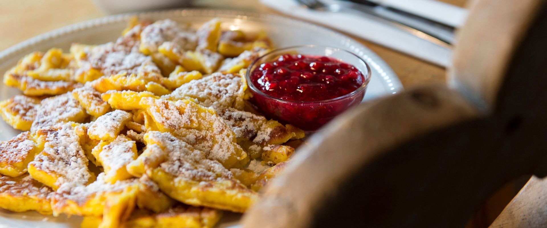 Kaiserschmarrn with cranberry jam Plate with Kaiserschmarrn and cranberry jam.