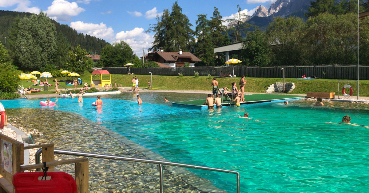 Natural bathing lake & Gries Sports Centre in Toblach, swimming pool in  Hochpustertal